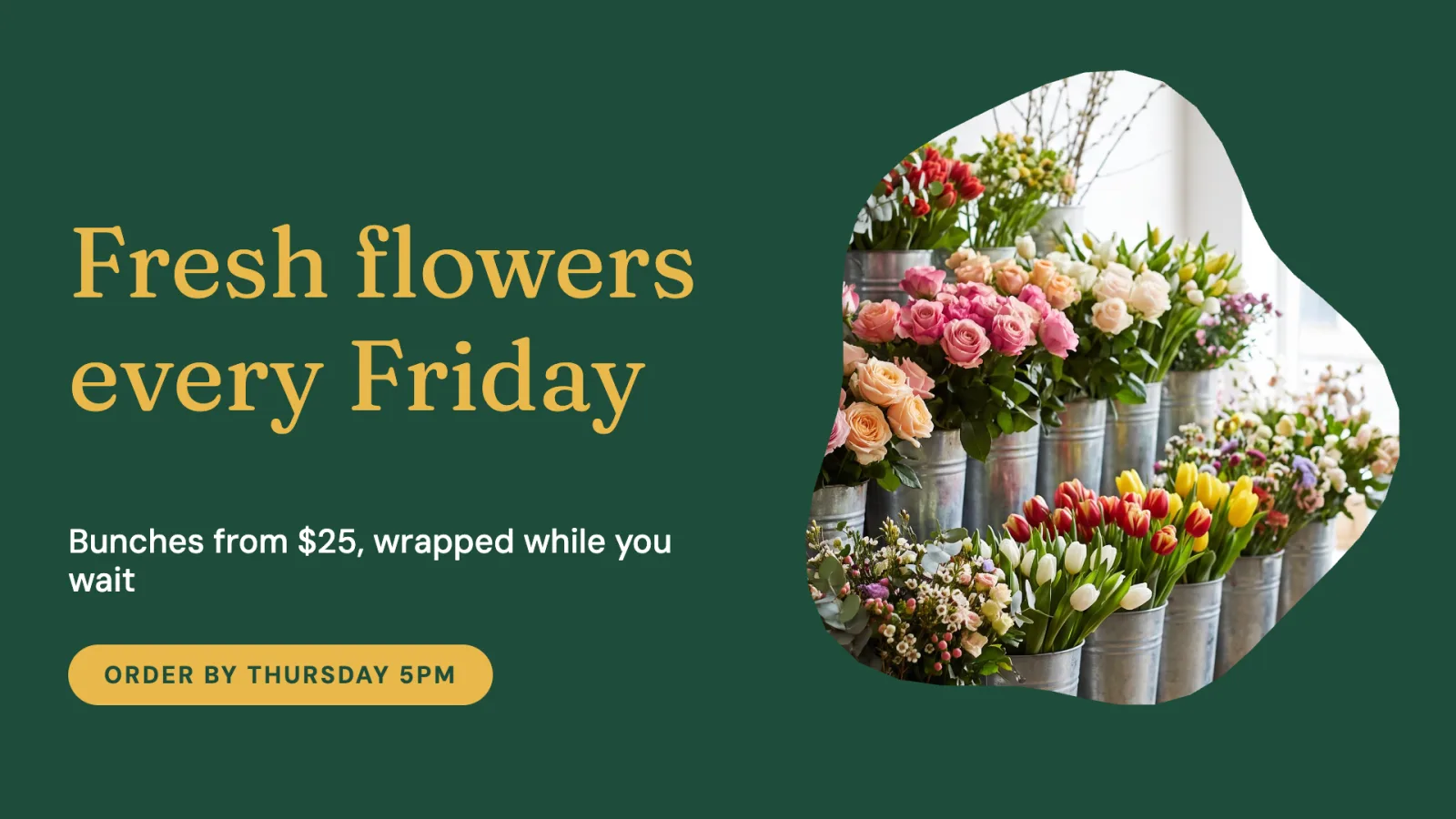 A Fresh flowers every Friday sign in a cafe’s green and amber brand colours