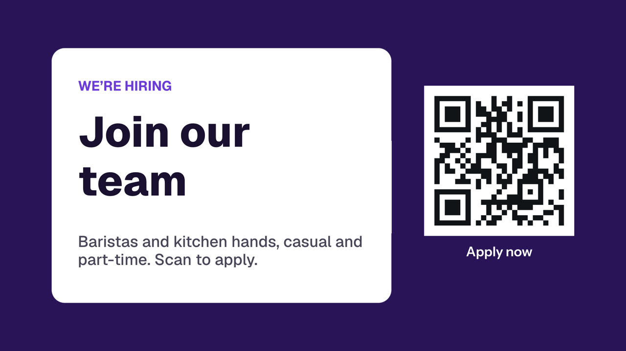 A sign: We’re hiring, join our team, with a QR code to apply