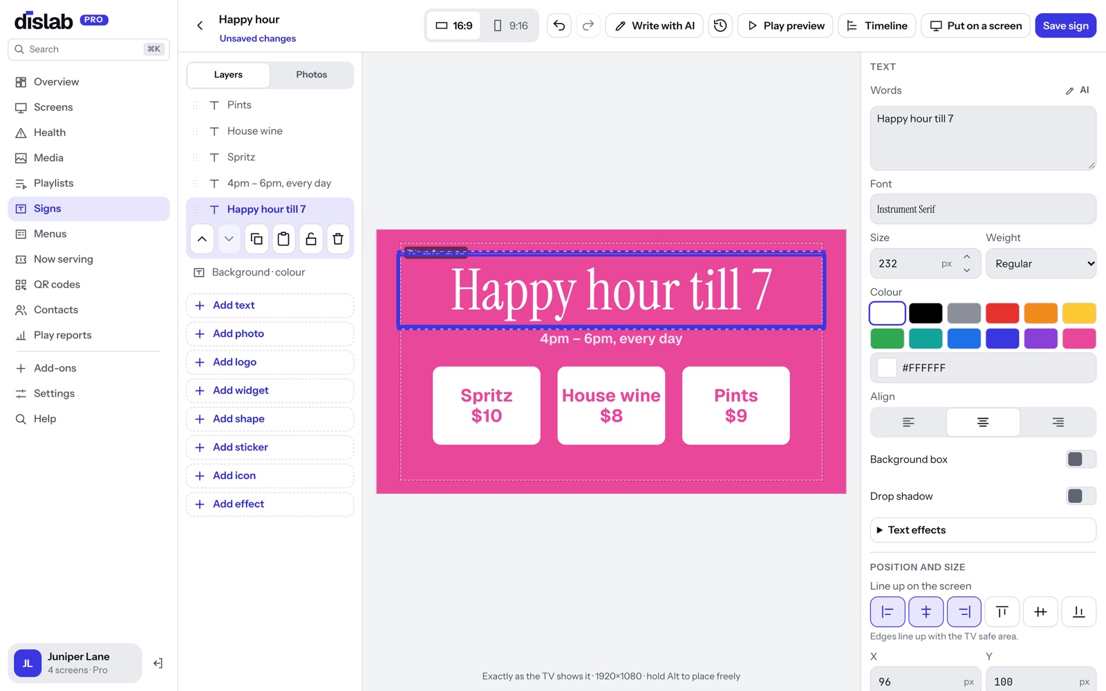 Typing straight onto a happy hour sign in the Dislab sign designer